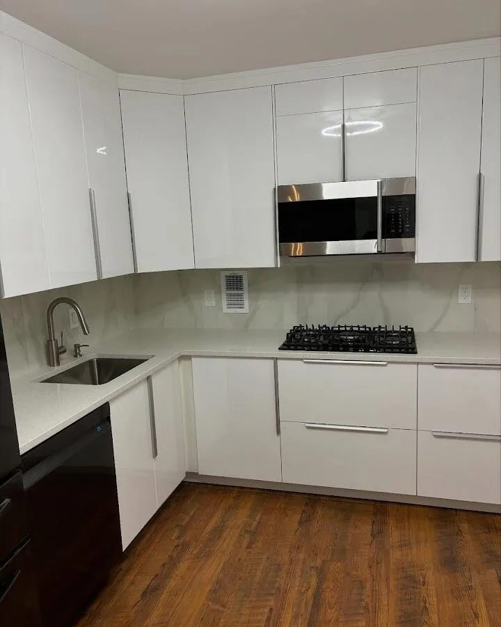 Restored kitchen with white cabinets after water damage in Norwood